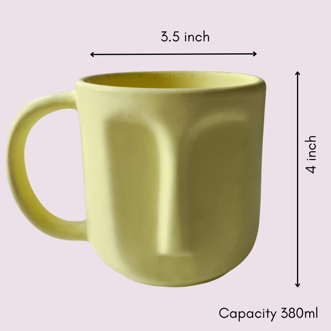  “Yellow ceramic face mug with measurements – 3.5 inch width, 4 inch height, 380ml capacity.”