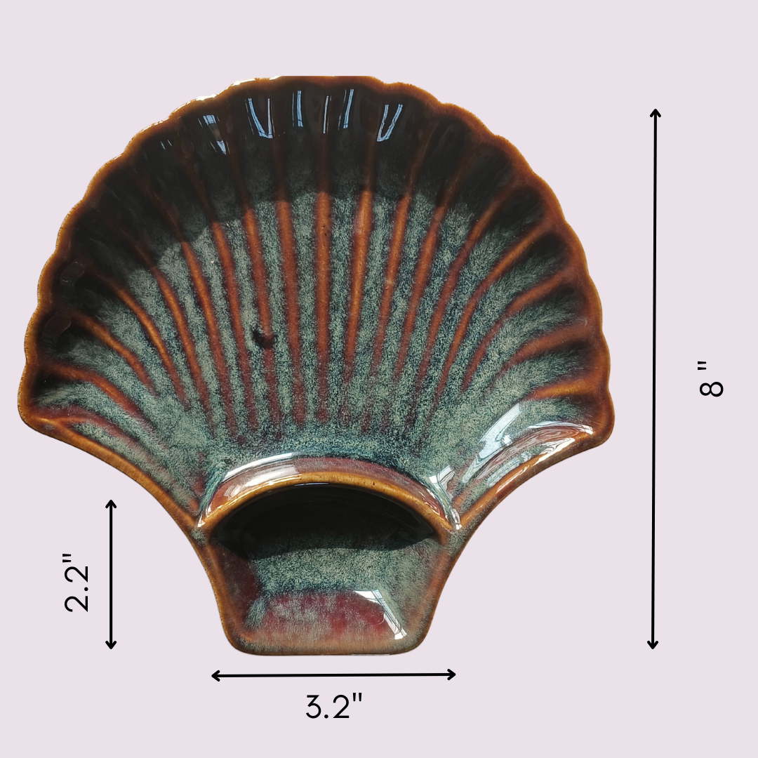 "Top view of shell-shaped ceramic platter with size dimensions labeled for online listing"