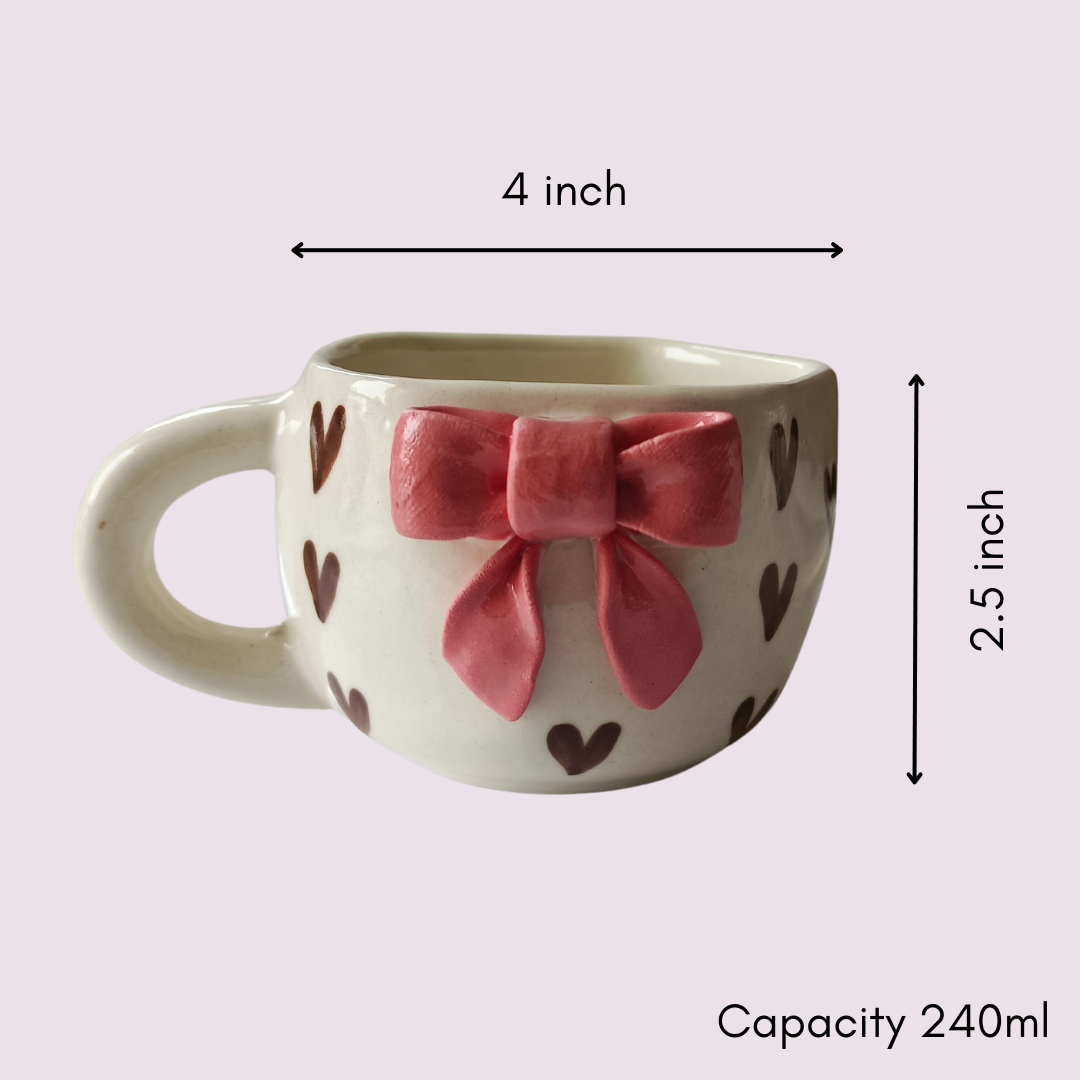 Dimensions of IndoCasa ceramic pink bow mug – 4 inch wide and 2.5 inch tall, 240ml capacity