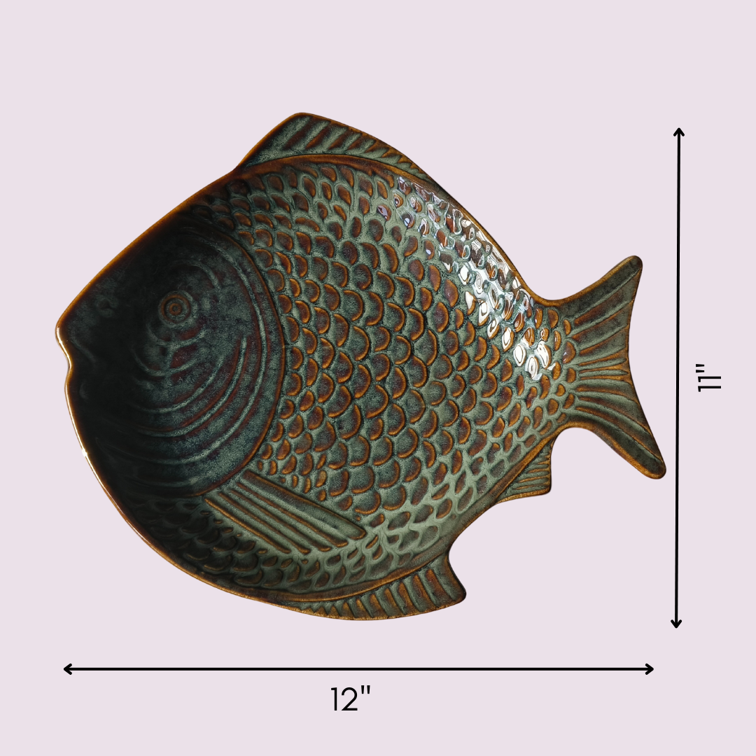 Top-down view of IndoCasa fish-shaped ceramic platter with dimensions: 12 inches by 11 inches