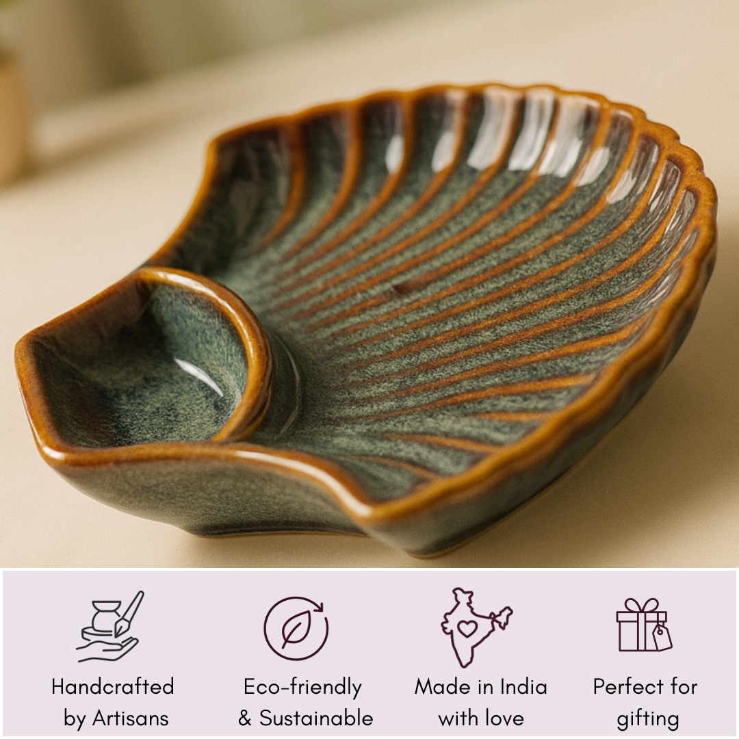 "Close-up of IndoCasa shell-shaped ceramic platter with eco-friendly and handcrafted feature icons"
